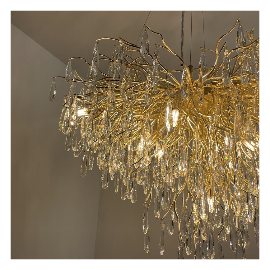 Crystal chandelier on a string 11xG9/40W/230V gold