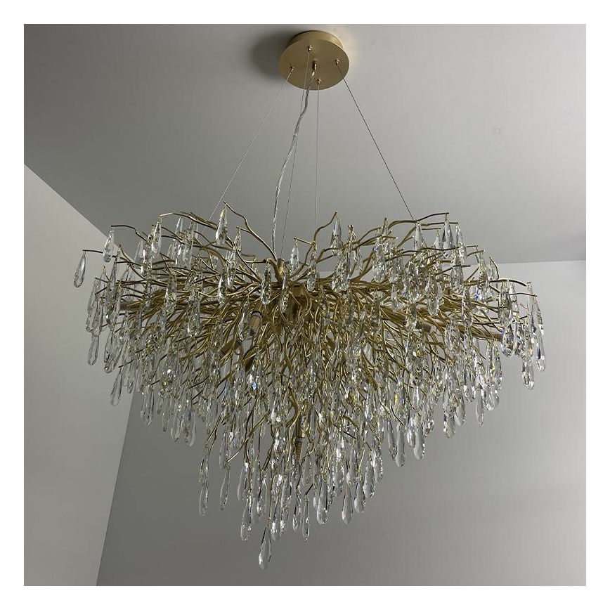 Crystal chandelier on a string 11xG9/40W/230V gold