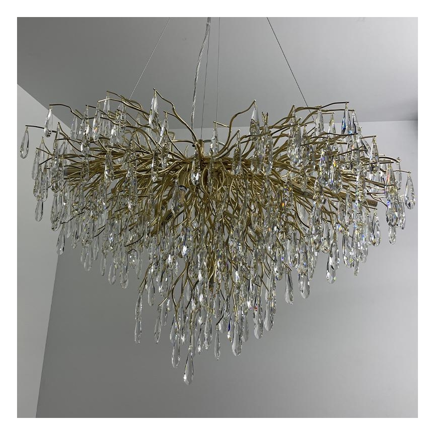 Crystal chandelier on a string 11xG9/40W/230V gold