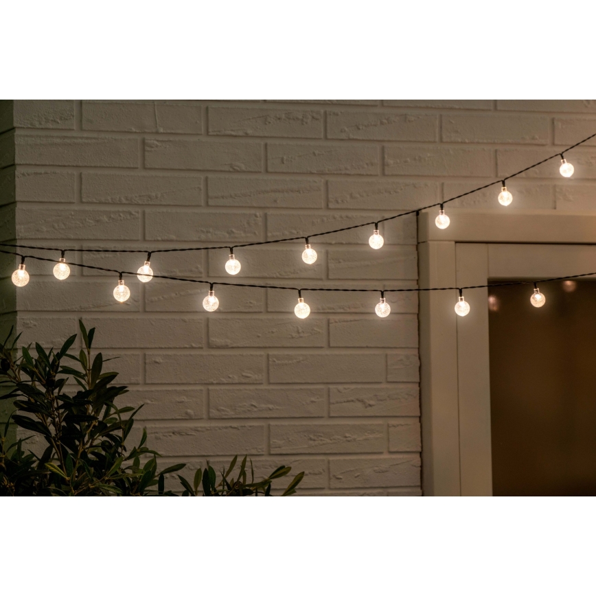 Grundig - LED Dimmable solar chain 50xLED/8 functions 9,35m warm white + remote control