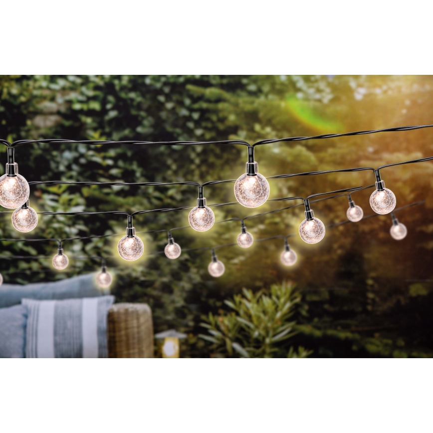 Grundig - LED Dimmable solar chain 50xLED/8 functions 9,35m warm white + remote control